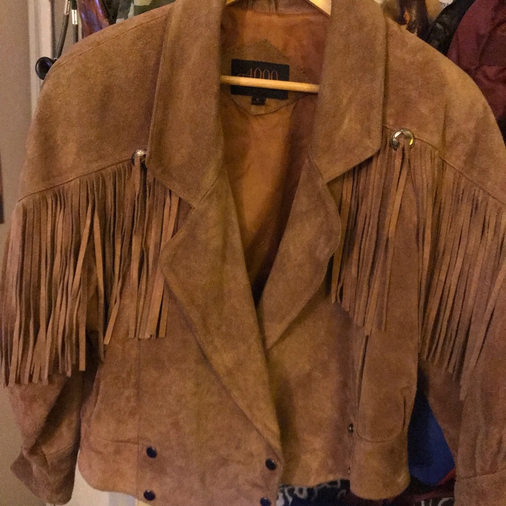 Buck skin leather jacket. Very comfortable &well made. No rips, tears, or stains